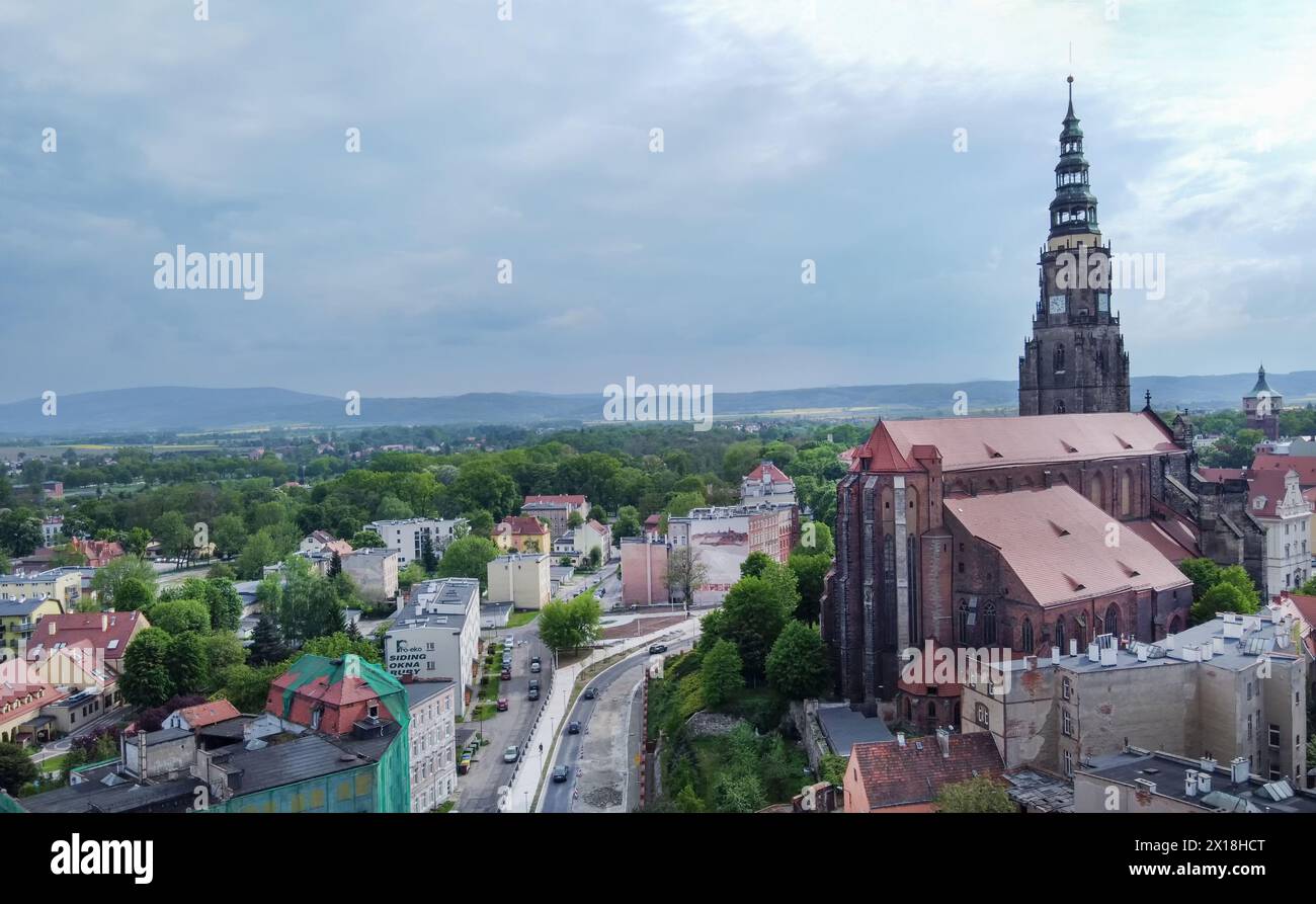 Drone point of view panorama with  St.Stanoislaus and St.Wenceslaus of  Swidnica town on Bystrzyca river- amazing old architecture and nature of  Poli Stock Photo
