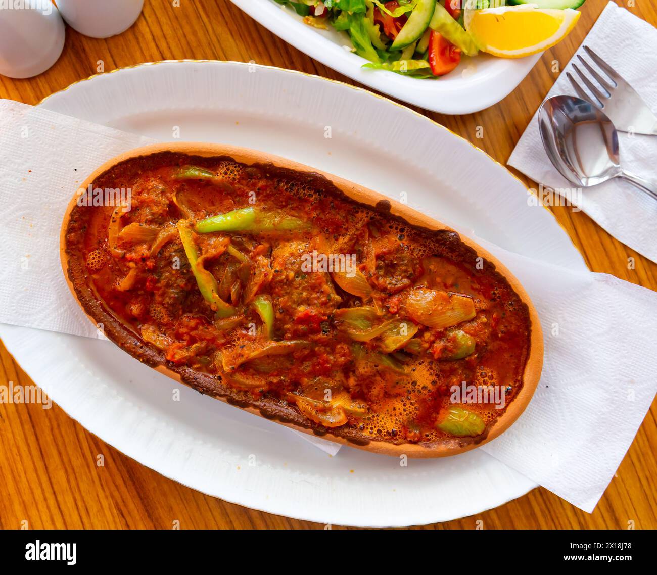 Izmir kofte, turkish dish of spicy meatballs Stock Photo - Alamy