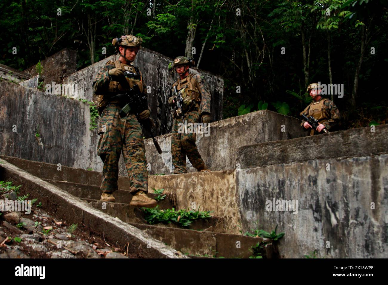 U.S. Marines with Echo Company, 2nd Battalion, 1st Marine Regiment, 1st Marine Division, conduct a jungle patrol during Marine Exercise 2024 near Cotabato City, Mindanao, Philippines, April 9, 2024. MAREX 2024 is a bilateral exercise between the U.S. Marine Corps and the Philippine Marine Corps designed to further enhance relationships, interoperability, and combined arms capabilities in a realistic training environment. (U.S. Marine Corps photo by Sgt. Ryan Hageali) Stock Photo