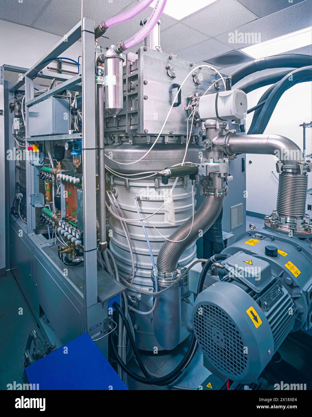 Lens Making Machine Automatic Machinery used in the manufacture of eyeglass lenses Stock Photo - Alamy