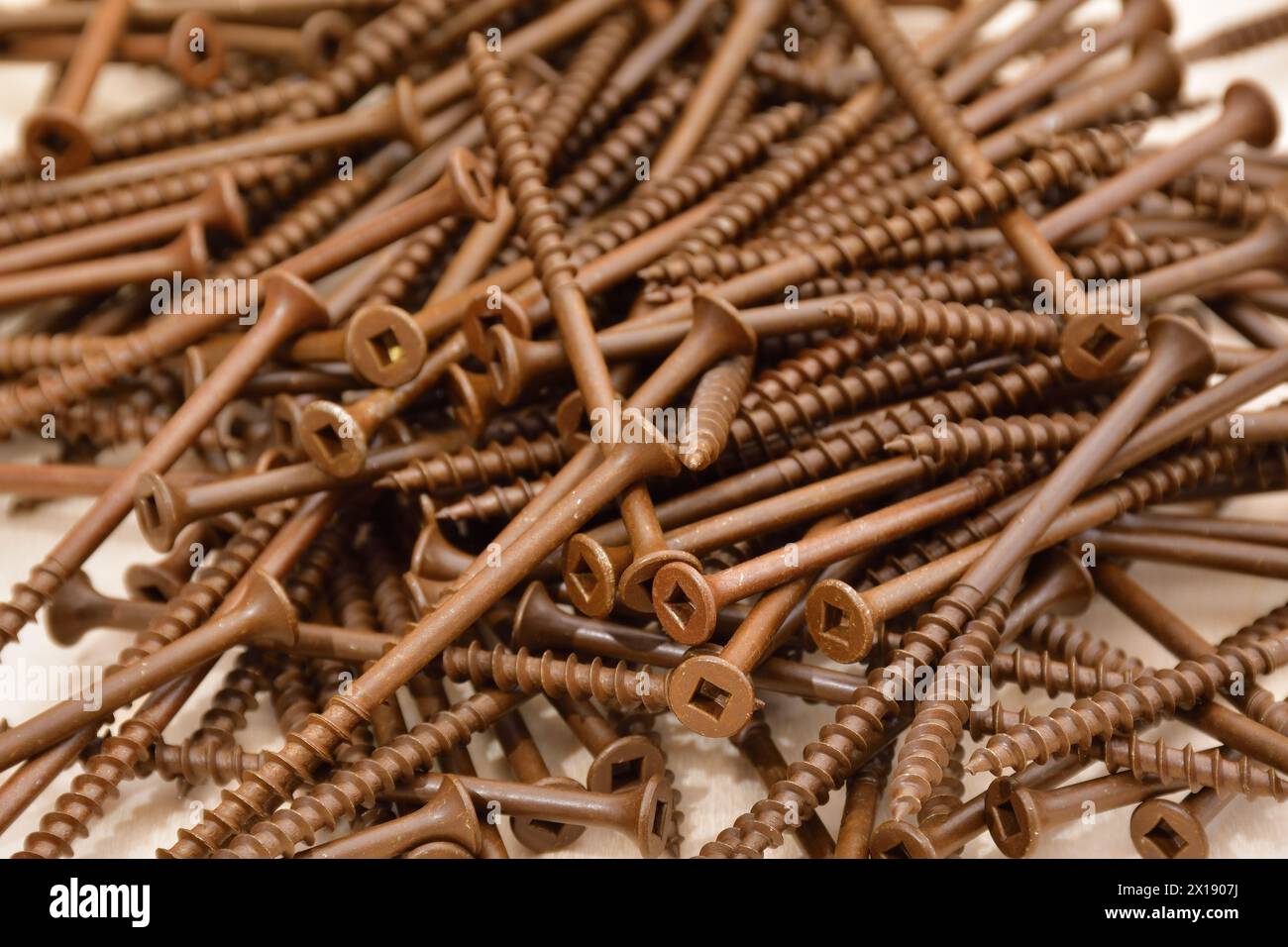 Ceramic coated brown flat head wood screws. Square head outdoor screws. Robertson deck screws