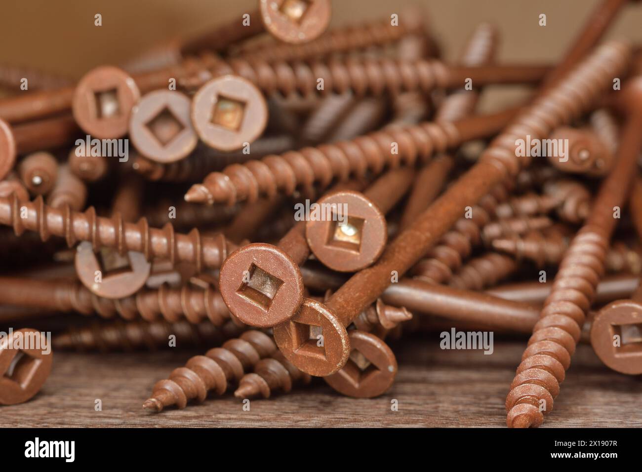 Ceramic coated brown flat head wood screws. Square head outdoor screws. Robertson deck screws