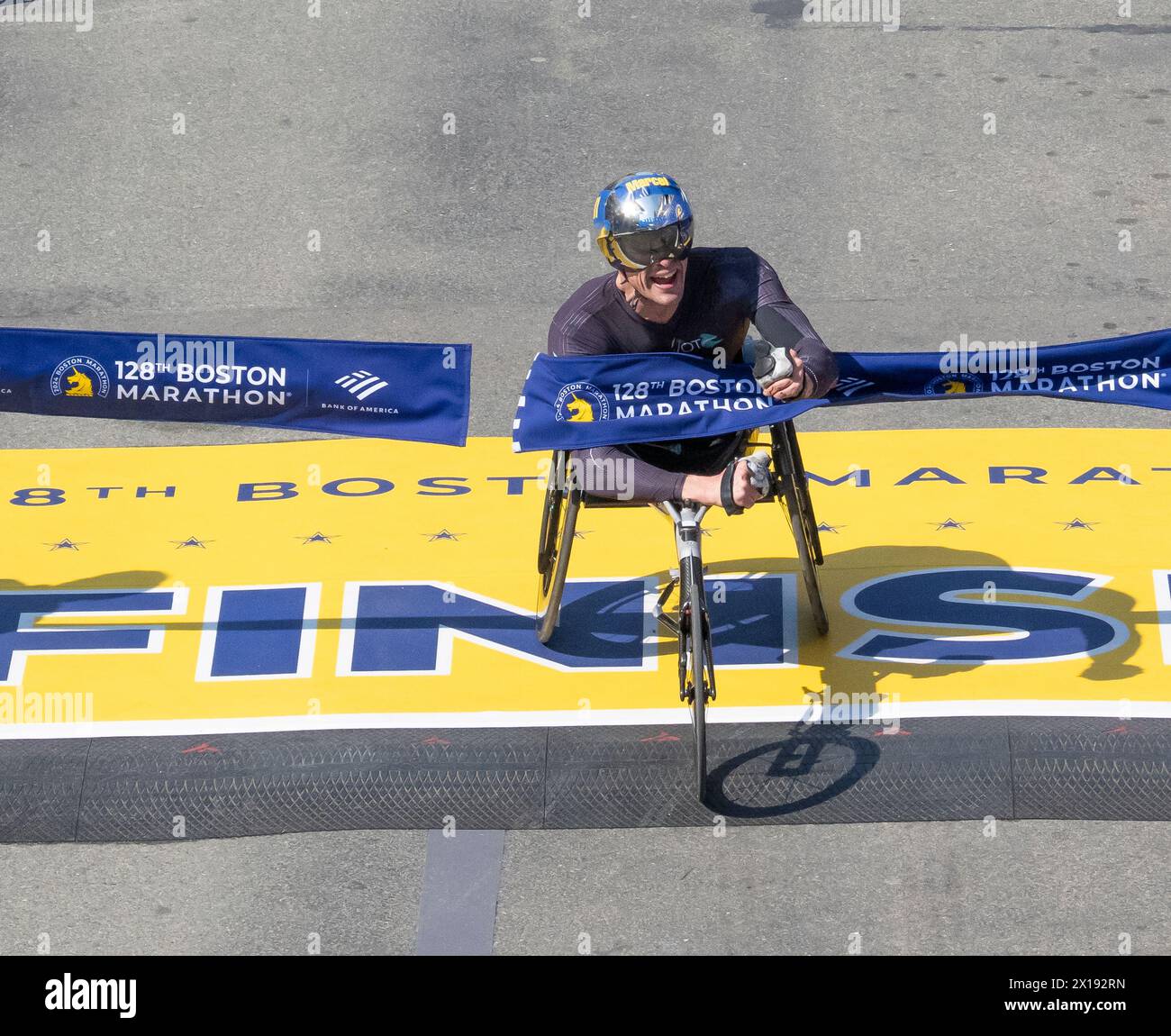 Boston, Massachusetts, USA  April 15, 2024 Marcel Hug of Sweden crossing the finish line in record time of the Mens Wheelchair division of the 128 running of the Boston Marathon in Copley Square, Boston, Massachusetts, USA on April 15, 2024. HugÕs record setting time on the 26.2 mile course was 1:15;33  ( Rick Friedman) Stock Photo