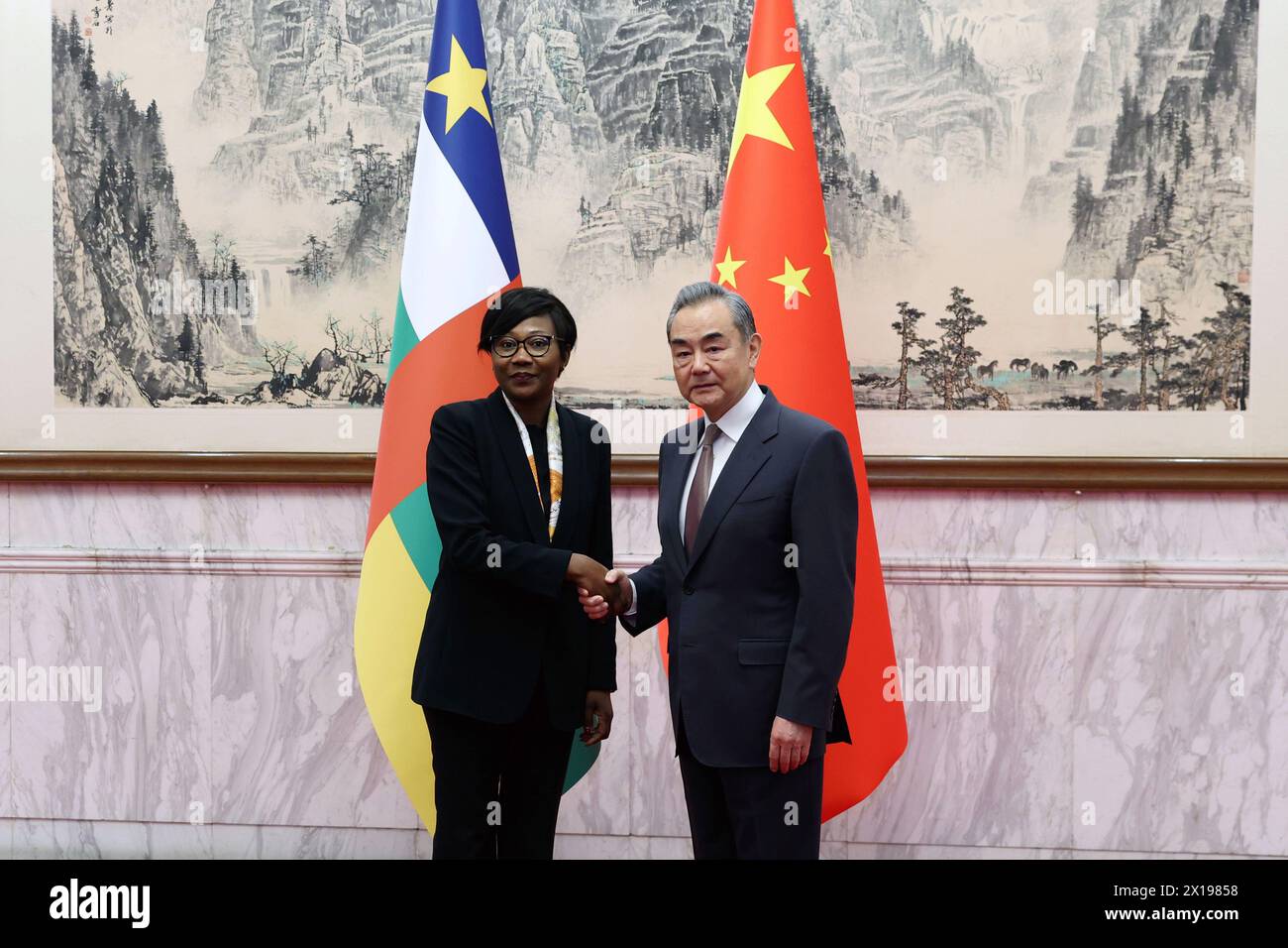 Beijing, China. 15th Apr, 2024. Chinese Foreign Minister Wang Yi, also a member of the Political Bureau of the Communist Party of China Central Committee, holds talks with Minister for Foreign Affairs of the Central African Republic Sylvie Baipo-Temon in Beijing, capital of China, April 15, 2024. Credit: Chen Bin/Xinhua/Alamy Live News Stock Photo