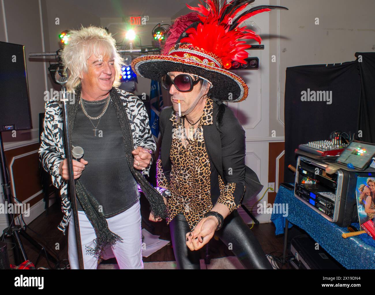 Tommy Edward, AKA Sir Rod, perform’s his Rod Stewart Tribute Show while host, WMMR Radio’s Jacky Bam Bam  does an impression of The Rolling Stones Ron Stock Photo