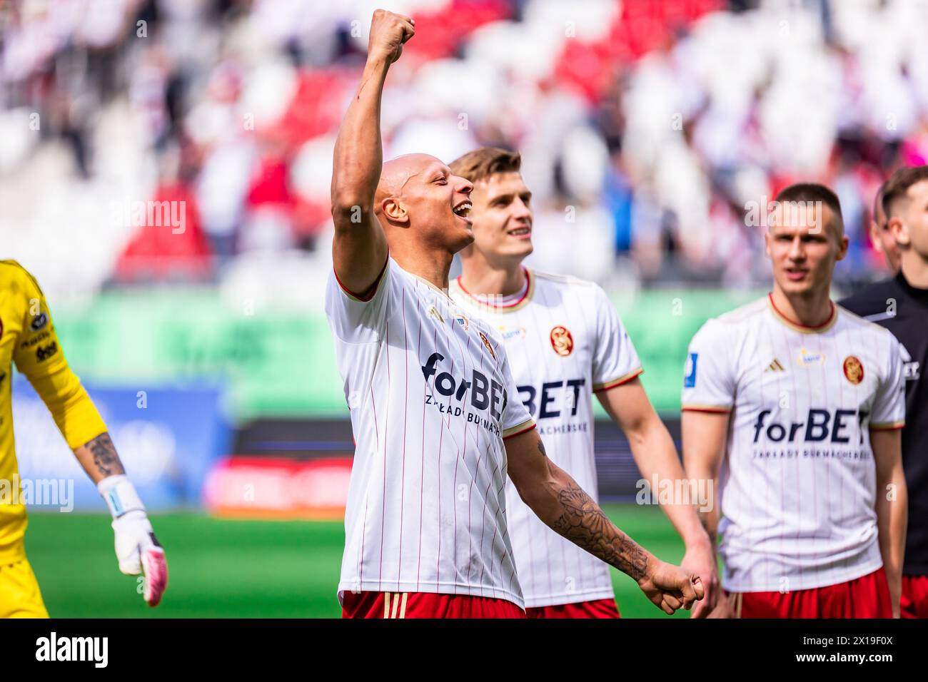 Lodz, Poland. 14th Apr, 2024. Kay Tejan of LKS celebrates a win after