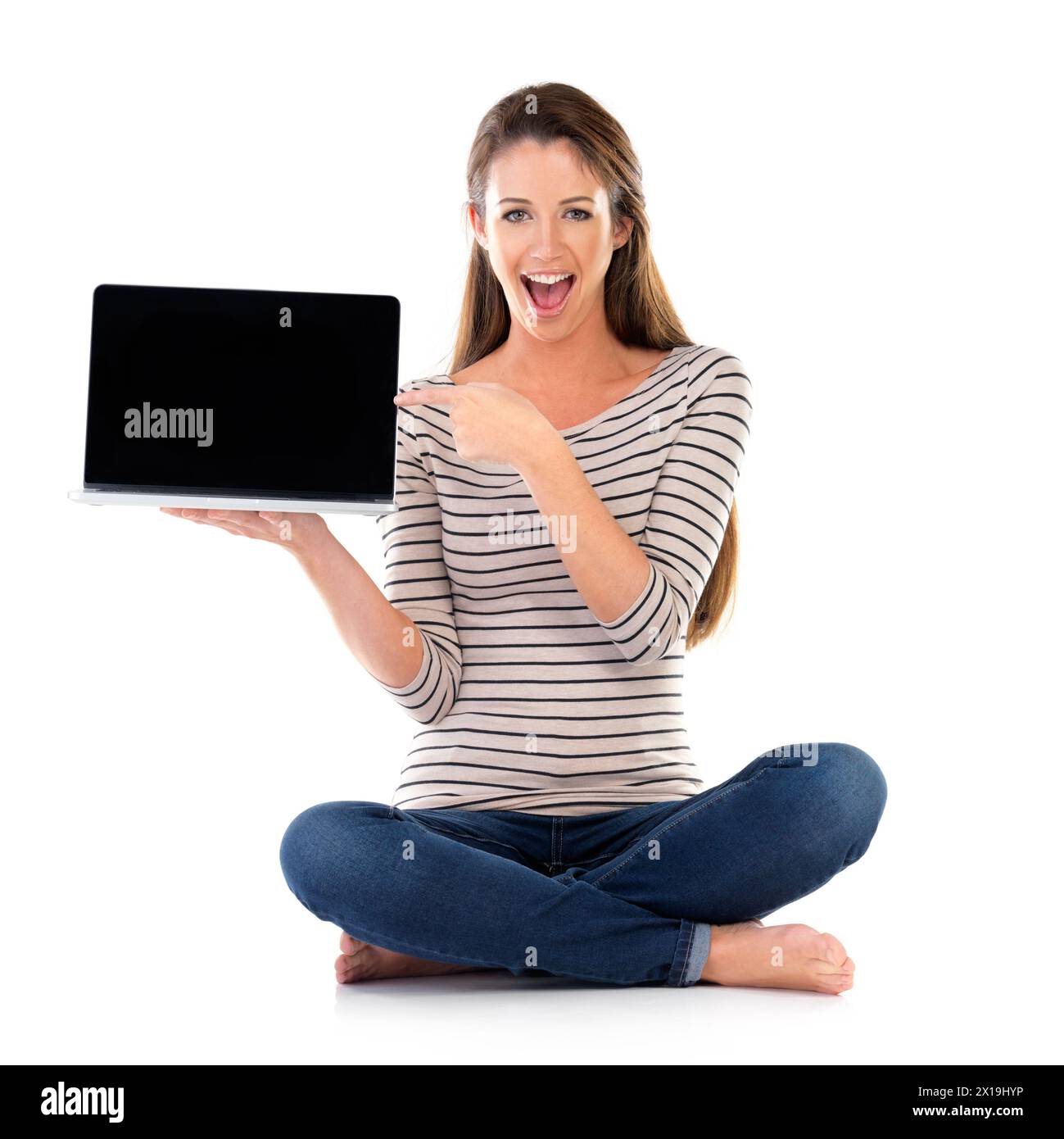 Laptop screen, portrait and woman with hand pointing to mockup in studio for wow news presentation on white background. Computer, space and shocked Stock Photo