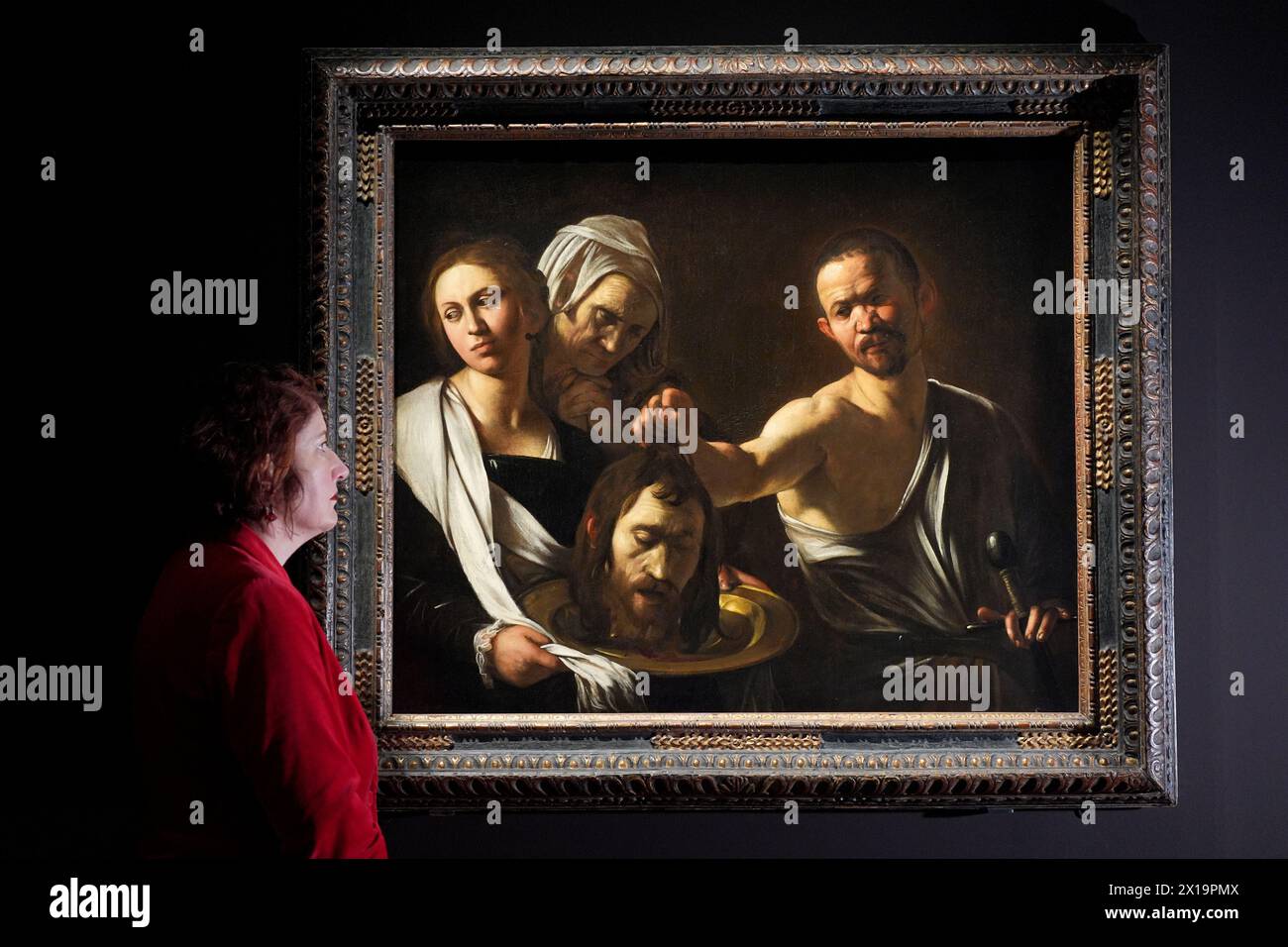 Salome receives the Head of John the Baptist (1609-10) on display during a preview of The Last Caravaggio exhibition at the National Gallery in London. The painting will be on view alongside The Martyrdom of Saint Ursula (1610), the last painting by artist Michelangelo Merisi da Caravaggio, which has not been seen in the UK for almost 20 years. Picture date: Tuesday April 16, 2024. Stock Photo