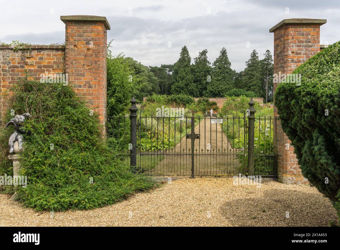 Gated entrance to  the Walled Garden at Turvey House, an 18th century English country house, Turvey, Bedfordshire, UK Stock Photo