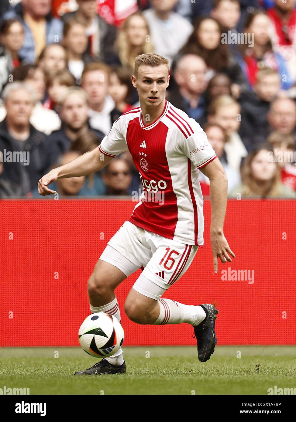 AMSTERDAM - Sivert Mannsverk of Ajax during the Dutch Eredivisie match between Ajax Amsterdam and FC Twente at the Johan Cruijff ArenA on April 14, 2024 in Amsterdam, Netherlands. ANP | Hollandse Hoogte | MAURICE VAN STEEN Stock Photo