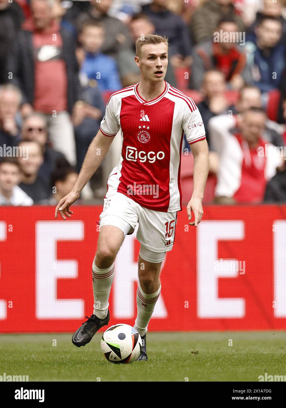 AMSTERDAM - Sivert Mannsverk of Ajax during the Dutch Eredivisie match between Ajax Amsterdam and FC Twente at the Johan Cruijff ArenA on April 14, 2024 in Amsterdam, Netherlands. ANP | Hollandse Hoogte | MAURICE VAN STEEN Stock Photo