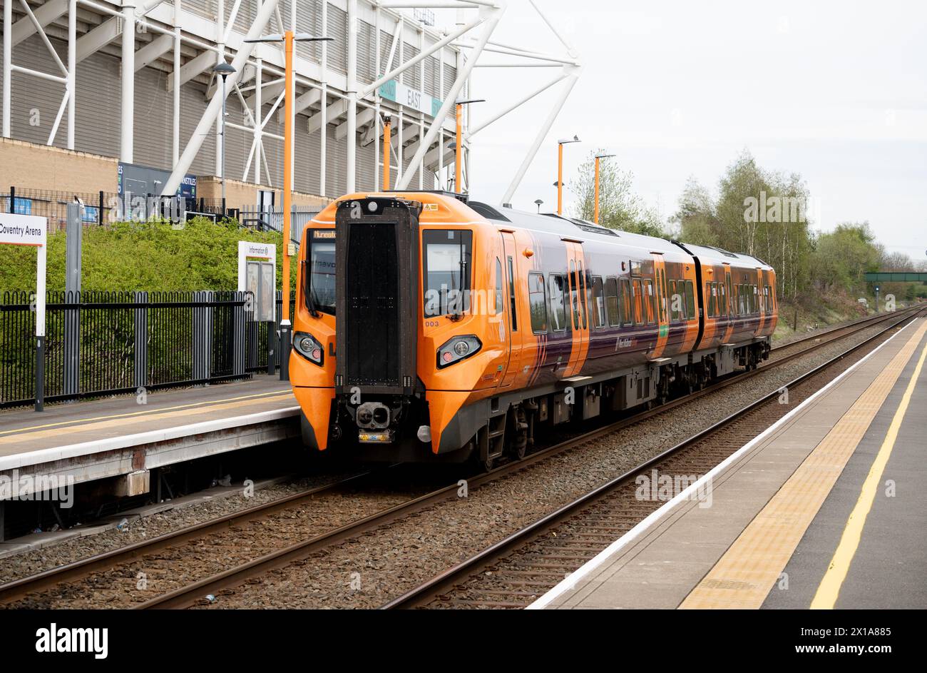 West Midlands Railway class 196 diesel train at Coventry Arena station, Coventry, UK Stock Photo