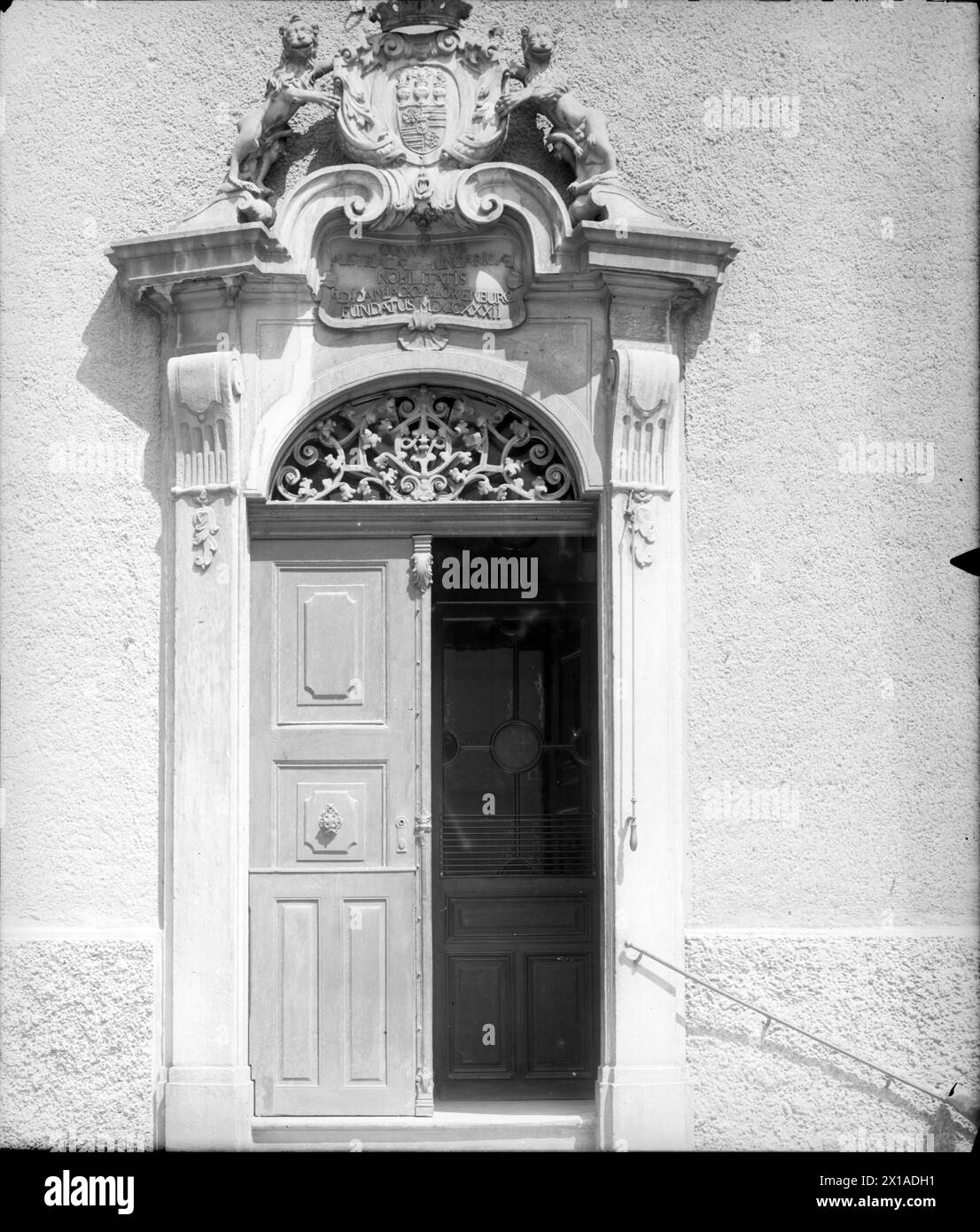 Vienna 8, Loewenburg seminary, Piarists school: portal with coat of arms cartouche, flank of two lion, between inscription with year established 1732, 1899 - 18990101 PD0708 - Rechteinfo: Rights Managed (RM) Stock Photo