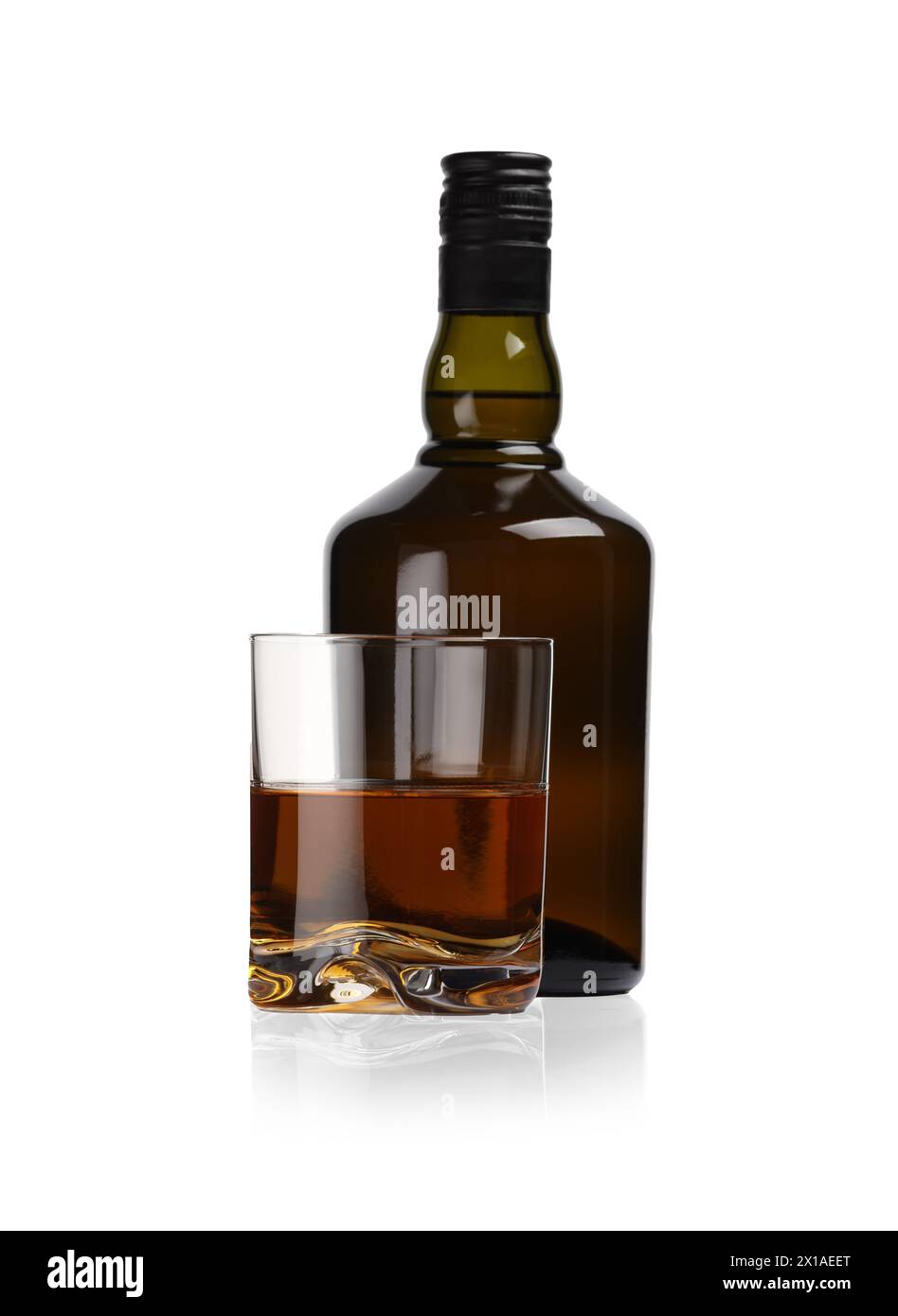 Glass and bottle of whiskey isolated on white Stock Photo