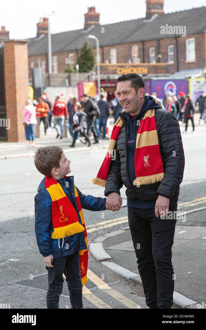 Father and son liverpool fc supporter an hour before kick-of at Anfield. Stock Photo
