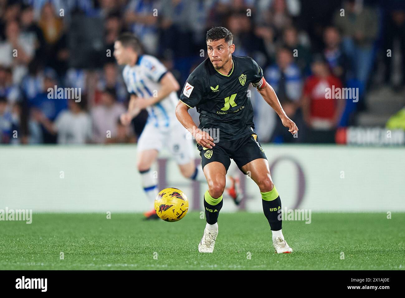 Lucas Robertone of UD Almeria with the ball during the LaLiga EA Sports match between Real Sociedad and UD Almeria at Reale Arnea Stadium on April 14, Stock Photo