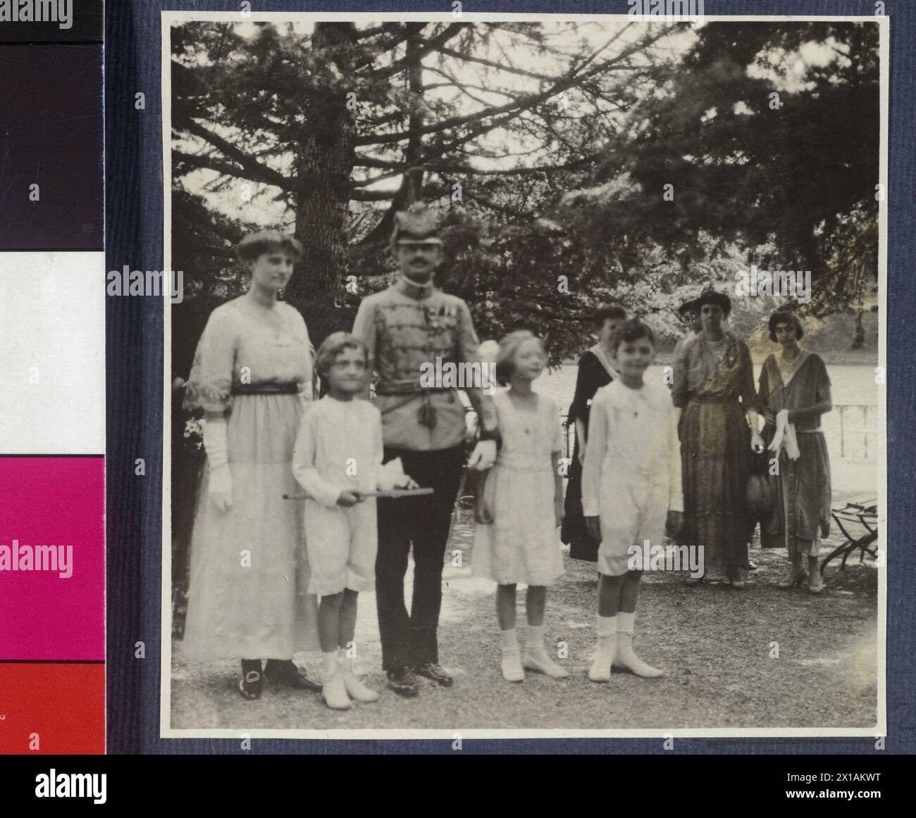 Charles Habsburg on Hertenstein Castle, former emperor Charles in uniform in the park of Hertenstein Castle, surround by the exiles imperial family. from the family album of the photographer, dated with 1921 / 1922., 28.08.1921 - 19210828 PD0014 - Rechteinfo: Rights Managed (RM) Stock Photo