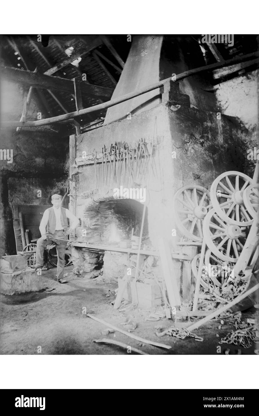 Bruck at the Lafnitz, blacksmith 'Hackerschmitten': of the master at the flue., 1924 - 19240101 PD1321 - Rechteinfo: Rights Managed (RM) Stock Photo