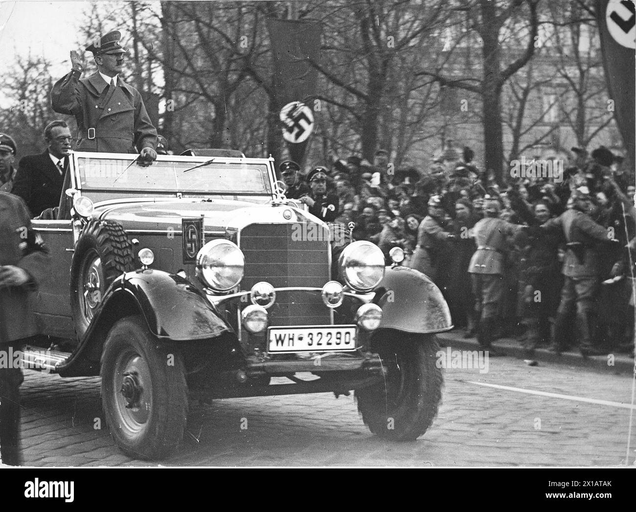 The Anschluss (Austrian Annexation) 1938, Hitler in Vienna, drive on the Ringstrasse, Seyss-Inquart in the rear of the car, 14.3.1938 - 19380314 PD0063 - Rechteinfo: Rights Managed (RM) Stock Photo
