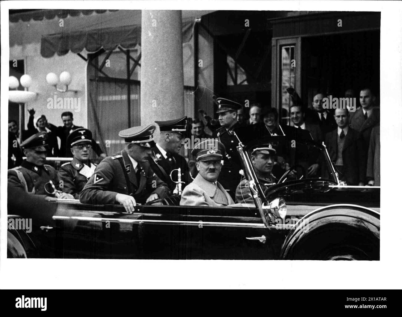 Hitler in Vienna, Hitler in the car in front of the Hotel Imperial, also in the car: Seyss-Inquart and Kaltenbrunner, 15.3.1938 - 19380315 PD0057 - Rechteinfo: Rights Managed (RM) Stock Photo