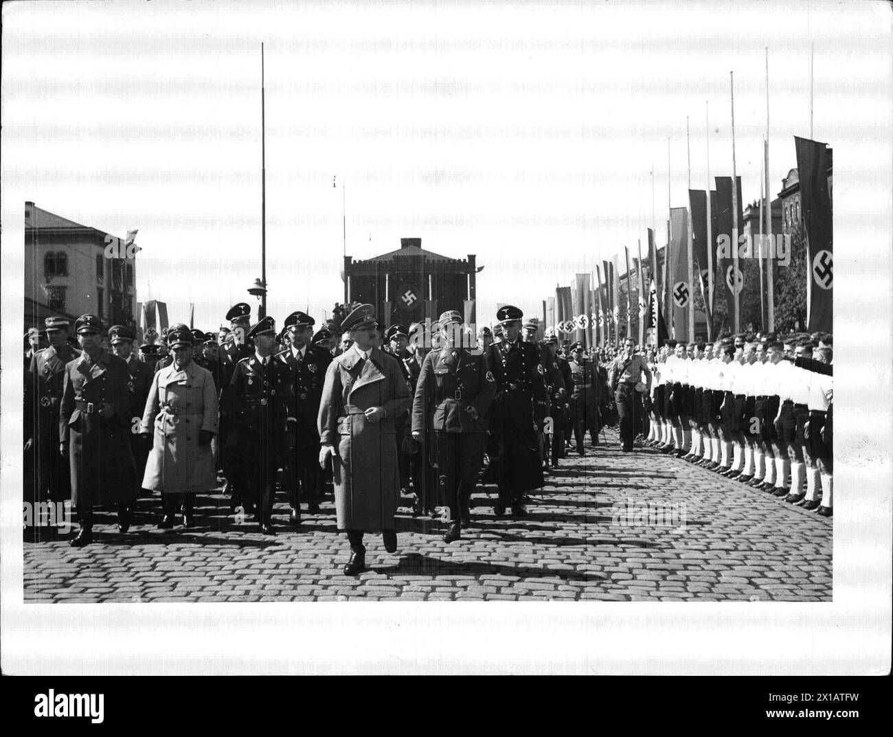 Day of the Greater German Empire in Vienna, Hitler treading after his arrival on the Westbahnhof raiwlay station going along the front of the guard of honour, from left: Hess, Buerckel, Kaltenbrunner, Himmler, Hitler, 9.4.1938 - 19380409 PD0041 - Rechteinfo: Rights Managed (RM) Stock Photo