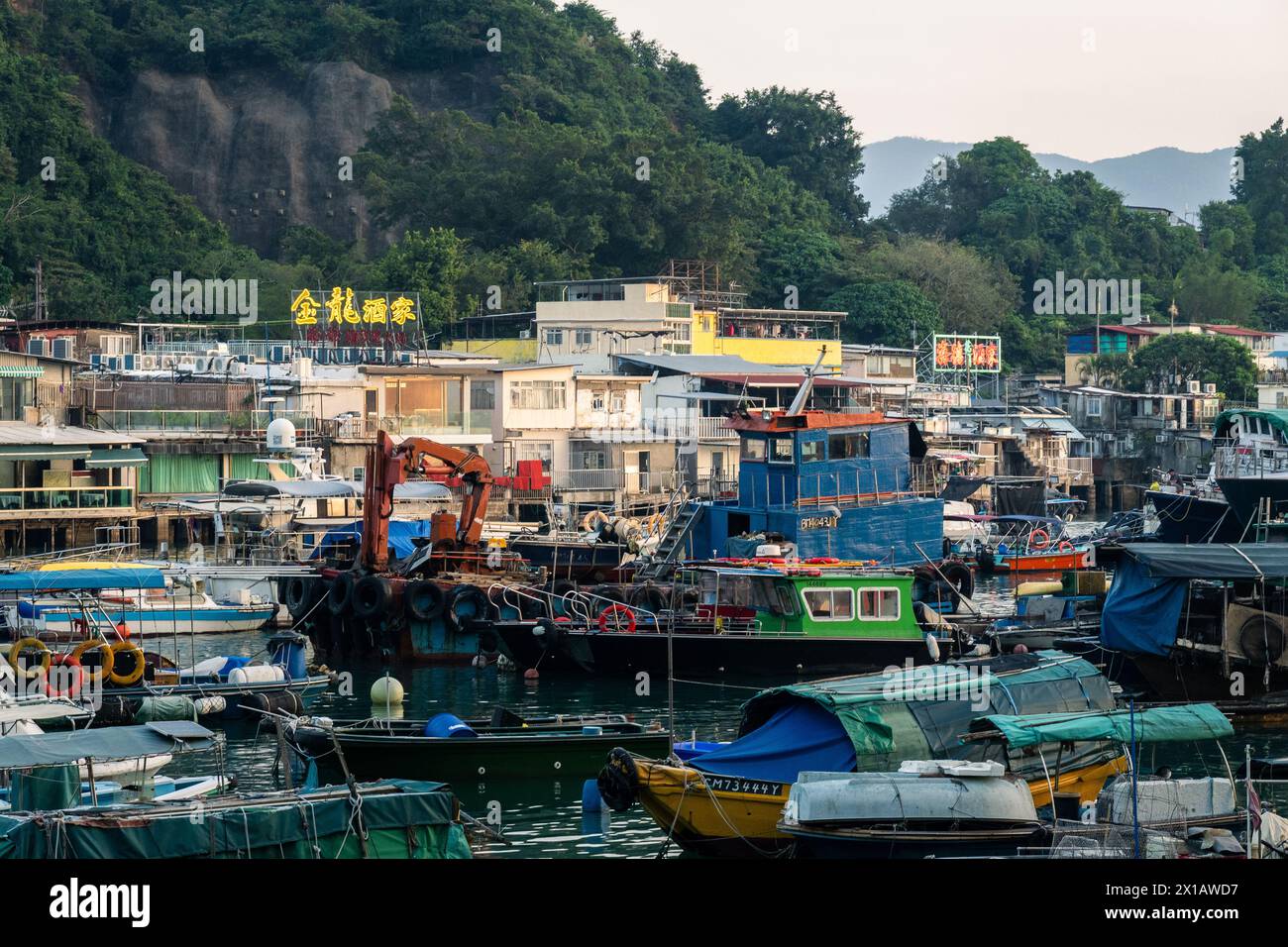 Lei Yue Mun, Hong Kong - October 23 2023: The seafront seafood restaurants in the fisherman village and harbor of Lei Yue Mun near Yau Tong in Kowloon Stock Photo