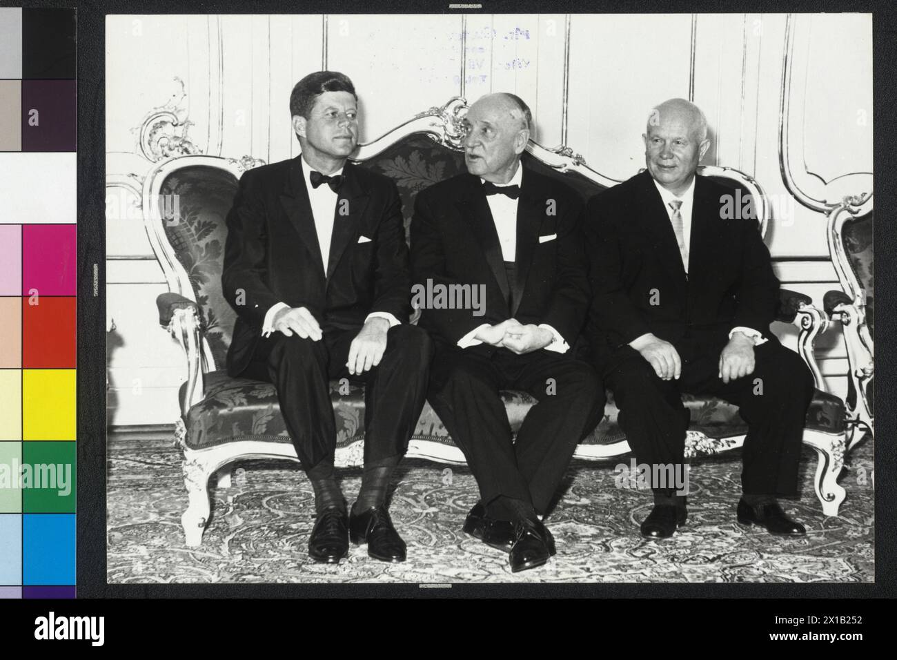 Kennedy and Khrushchev in Schoenbrunn with Federal President Schaerf, Kennedy (on the left), Khrushchev (on the right) and Schaerf (middle of the) on a sofa sitting, every defray dinner jacket, 1961 - 19610101 PD2601 - Rechteinfo: Rights Managed (RM) Stock Photo