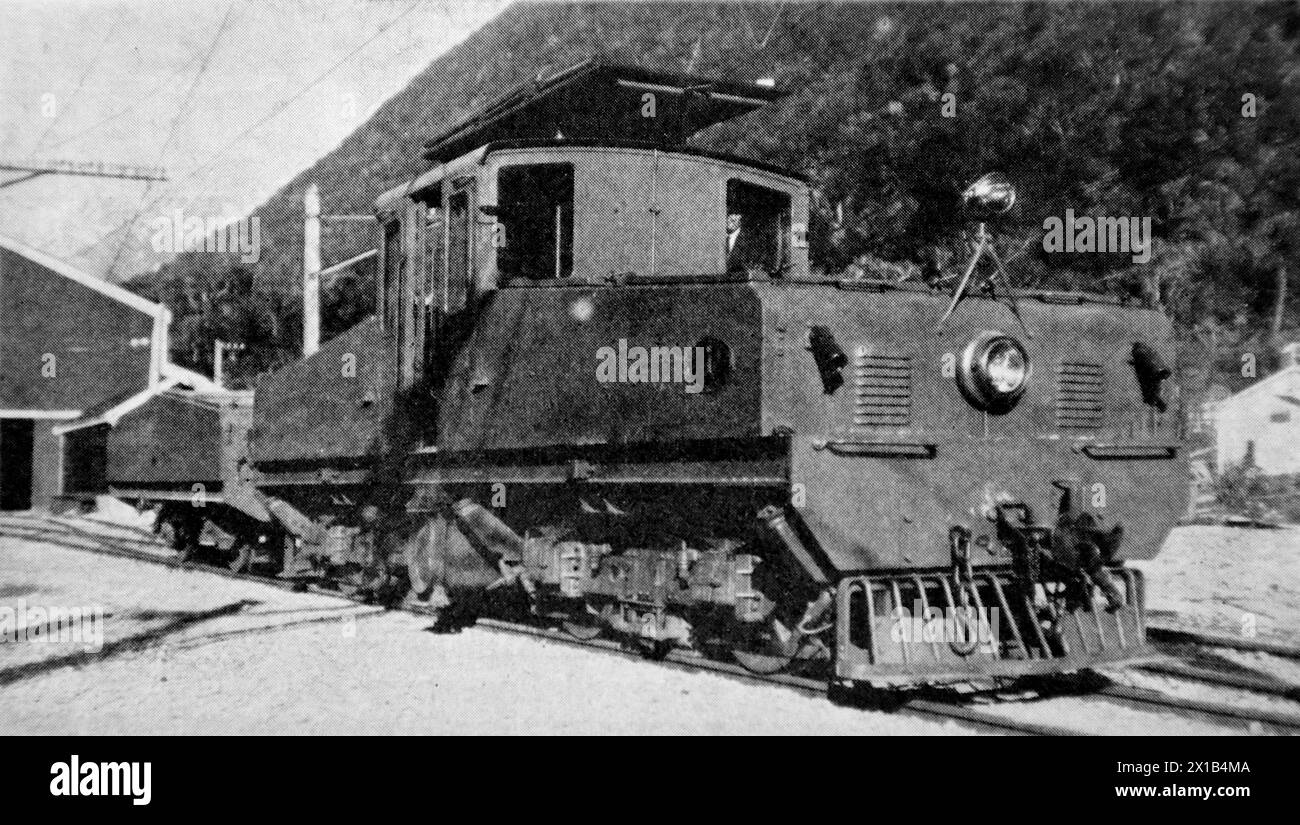 Electric battery locomotive No. E1, built by the English Electric Company Ltd, which includes a platform above the cab roof. From an original publication dated 15 May 1924, this helps to give an insight into public transport, and the railways in particular, of the 1920s. Stock Photo