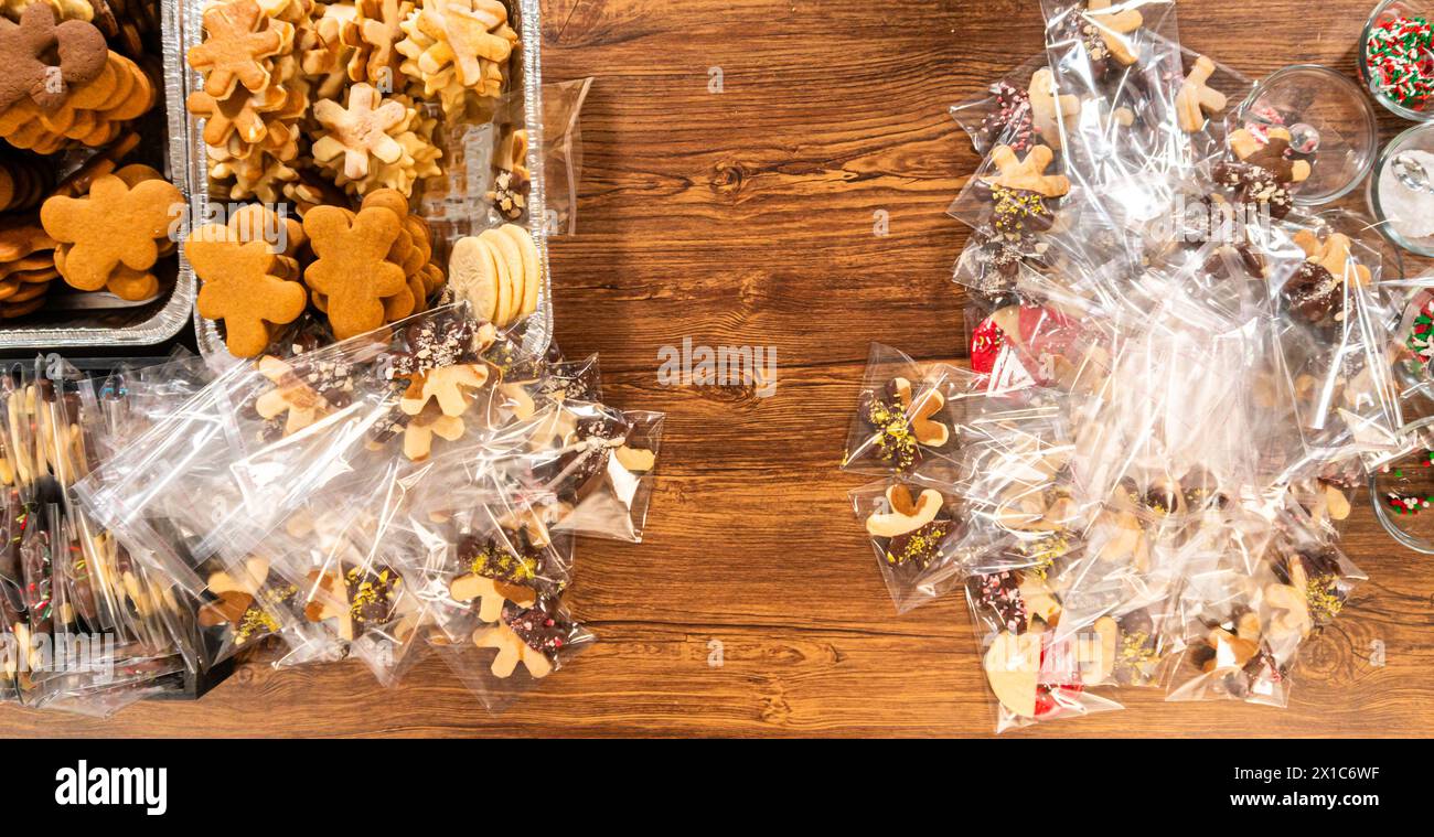 Christmas Cutout Cookies Dipped in Chocolate, Nut-Topped, Neatly Packaged Stock Photo