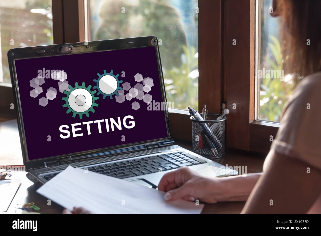 Laptop screen displaying a setting concept Stock Photo