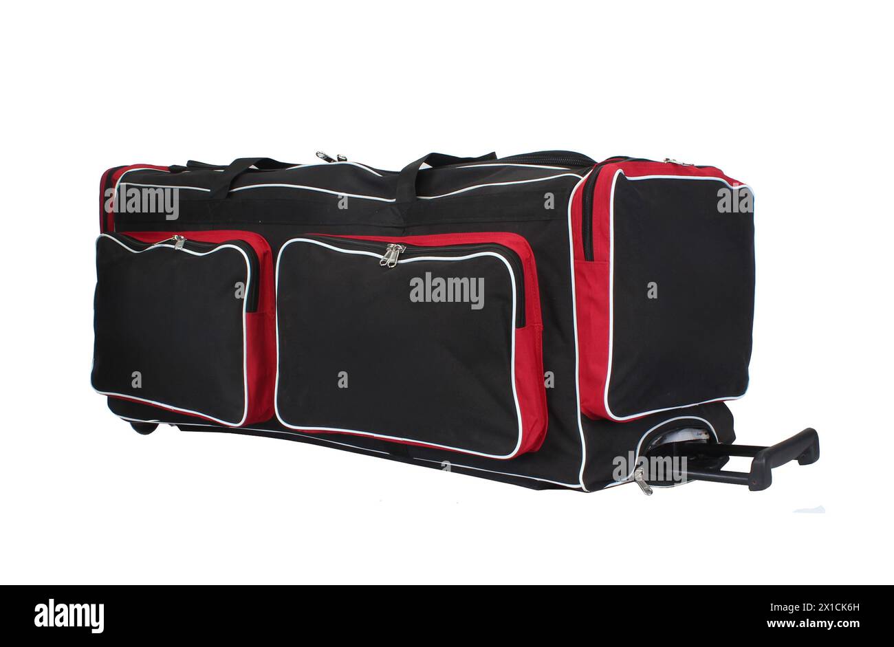 red and black cricket full size kit bag isolated on white background Stock Photo