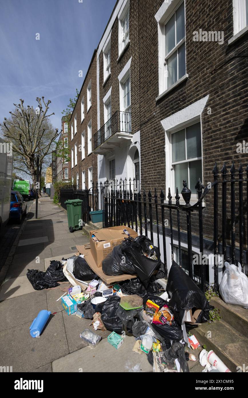 Residents dump their household waste on their Camden terraced house doorstep, London, England, United Kingdom Stock Photo