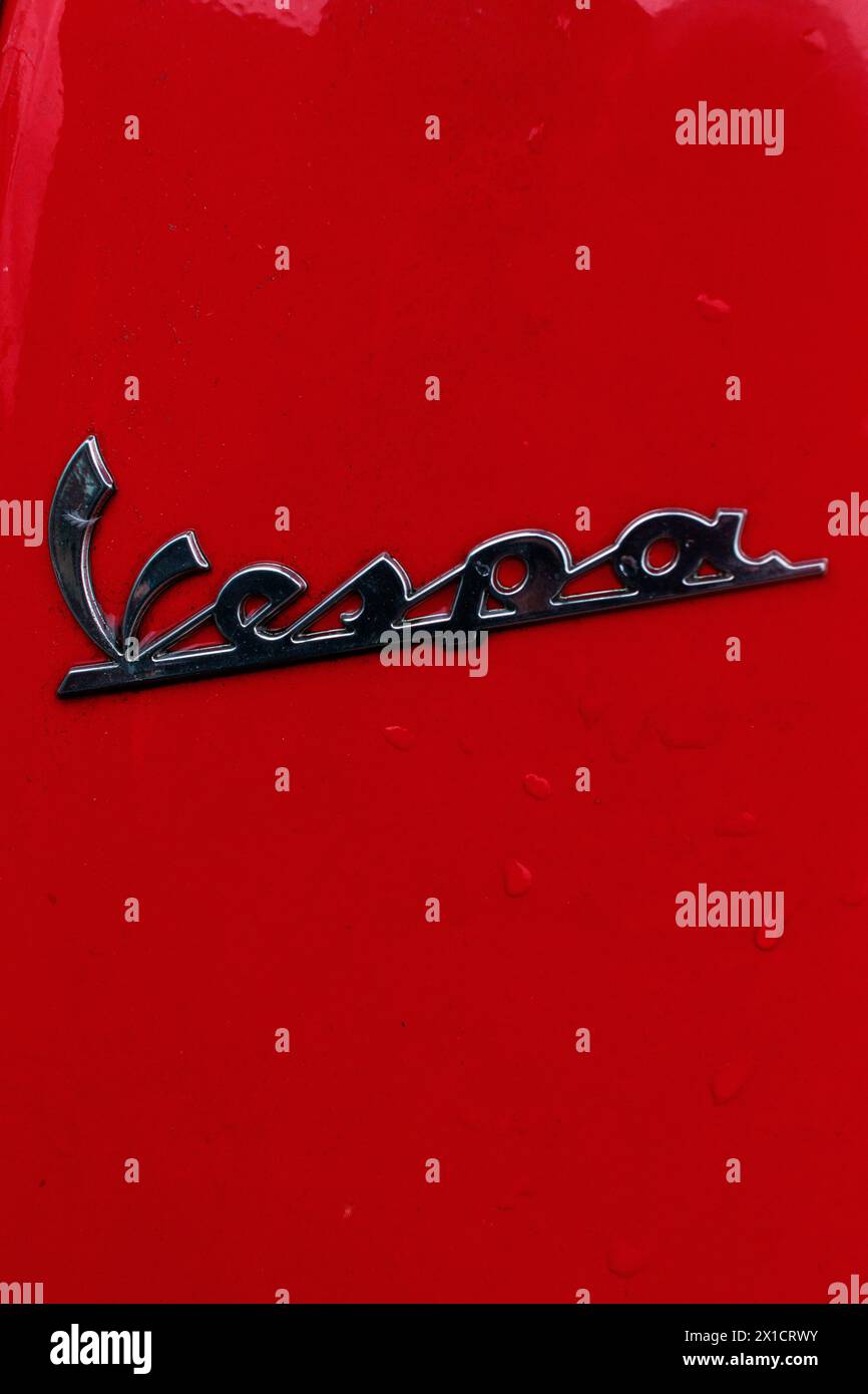 Vespa scooter badge on red paintwork, Genoa, Italy Stock Photo