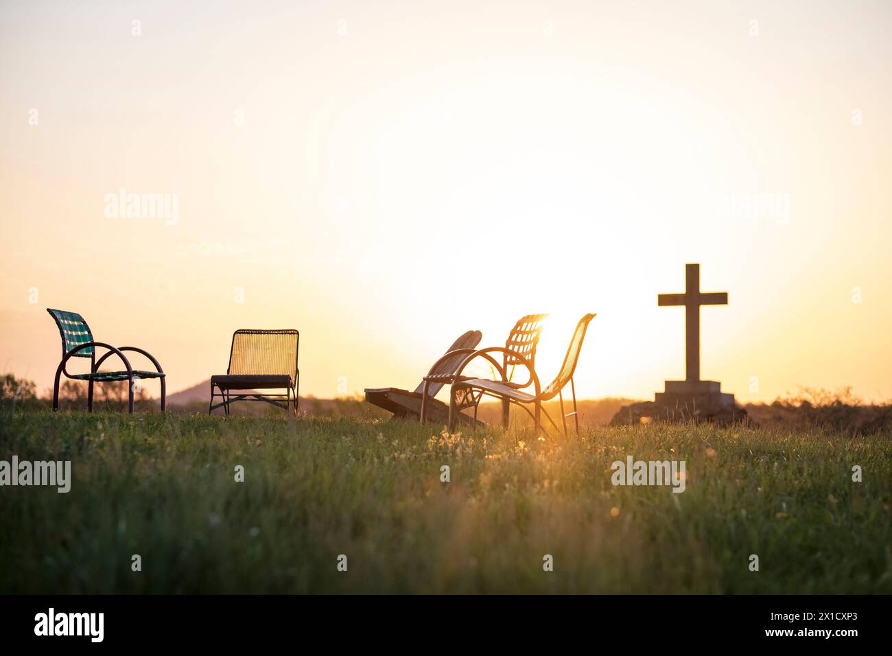 Cross and chairs on a knoll at the Abbey of Gethsemani near Bardstown, Kentucky, USA Stock Photo