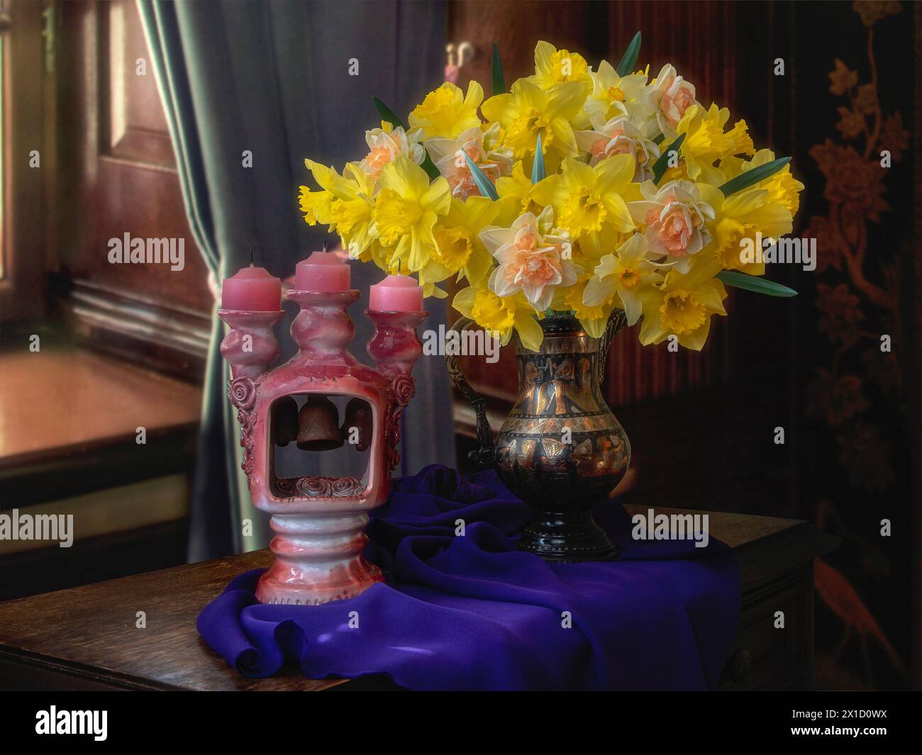 Still life with bouquet of yellow daffodils and candlestick Stock Photo ...