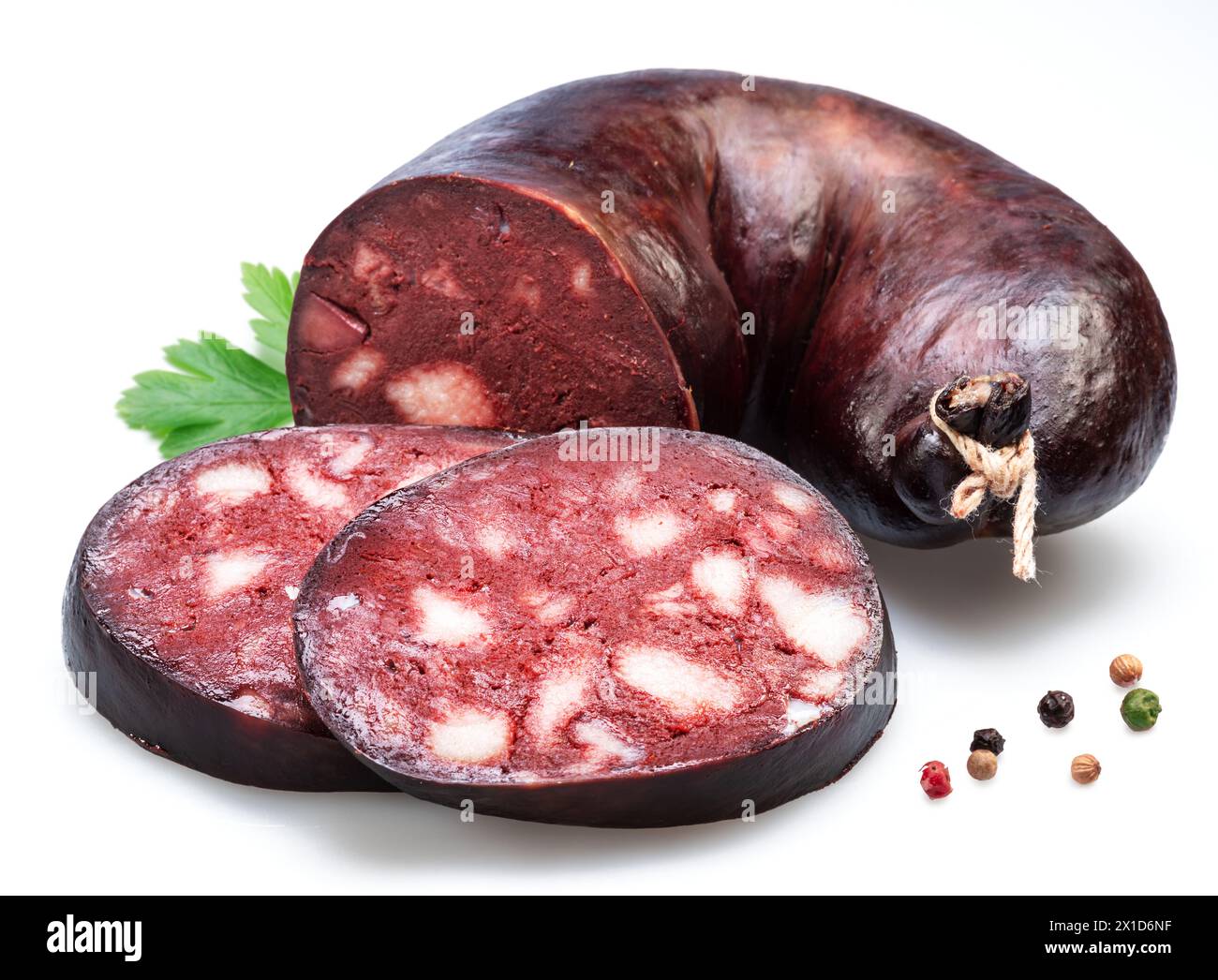 Blood sausage with suet pieces and parsley leaf isolated on white background. Stock Photo