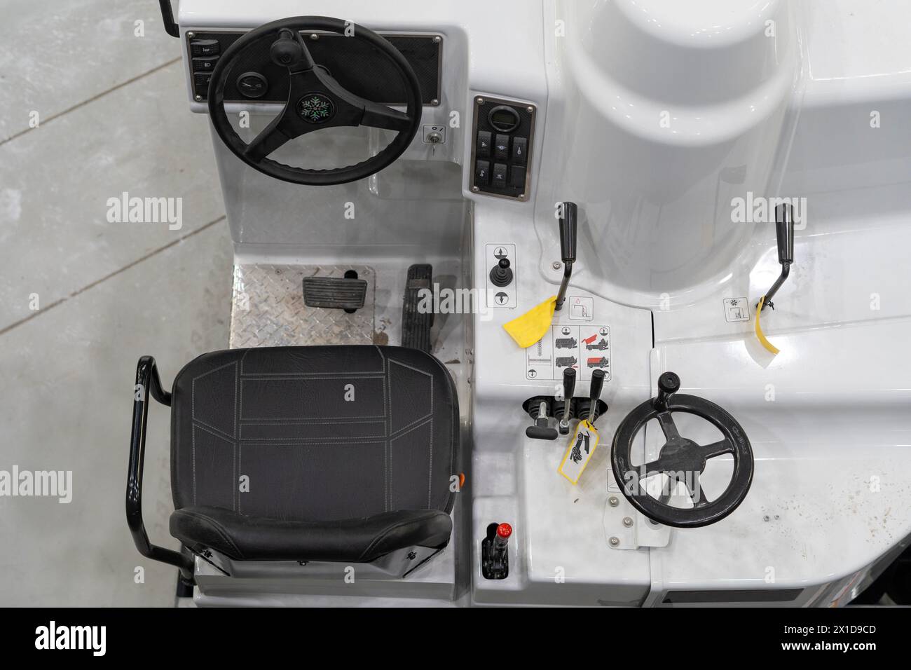 White ice rink maintenance machine photographed from above Stock Photo