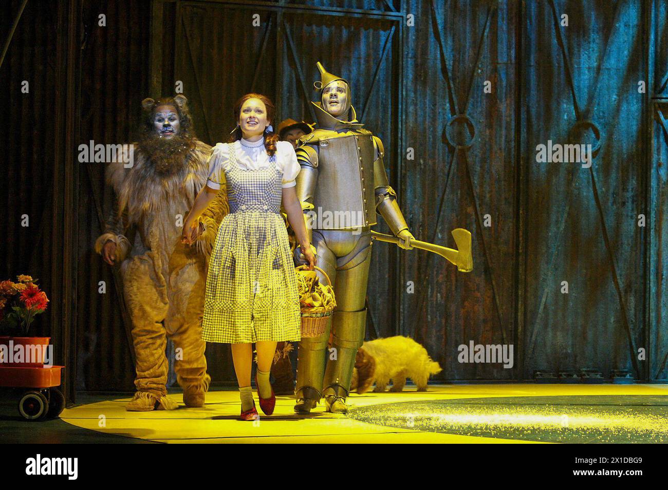 'Follow the yellow brick road' - l-r: Gary Wilmot (Cowardly Lion), Sian Brooke (Dorothy), Adam Cooper (Tin Man) with Bobby as 'Toto' in THE WIZARD OF OZ at the Royal Festival Hall, Southbank Centre, London SE1  29/07/2008 after the novel by by L. Frank Baum  music & lyrics: Harold Arlen & E. Y. Harburg   adapted by John Kane for the RSC  design: Michael Vale  lighting: Mike Gunning  choreography: Nick Winston  director: Jude Kelly  Royal Festival Hall (RFH), Southbank Centre, London SE1    29/07/2008 Stock Photo
