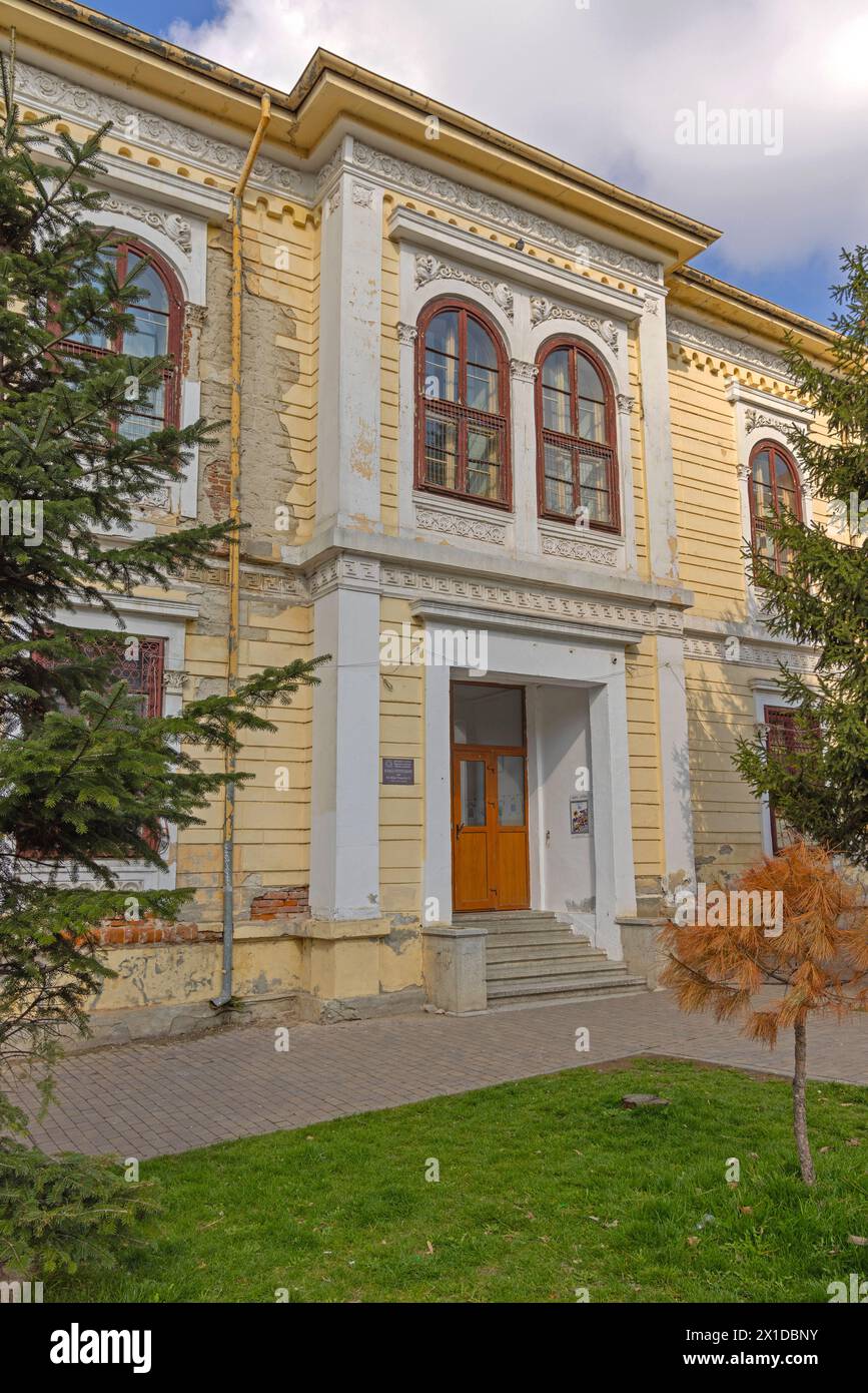 Craiova, Romania - March 16, 2024: School Otetelesanu Historic Landmark Building at Mihai Viteazul Street Spring Day. Stock Photo
