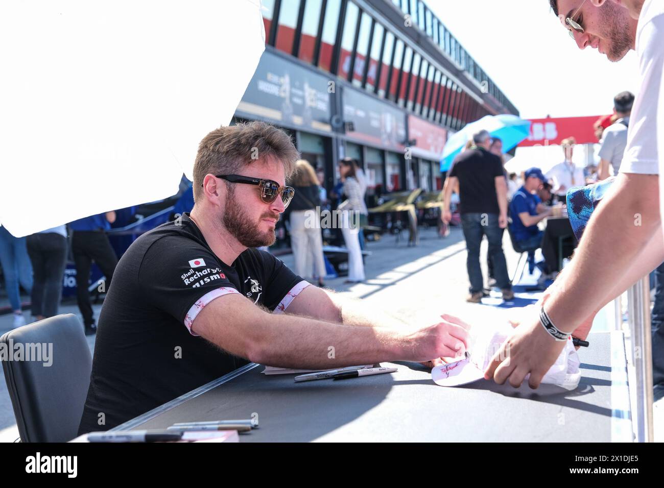 Oliver Rowland of Nissan Formula E Team meets the fans during the autograph session at the ABB Formula E World Championship 2024 Misano E-Prix. Stock Photo
