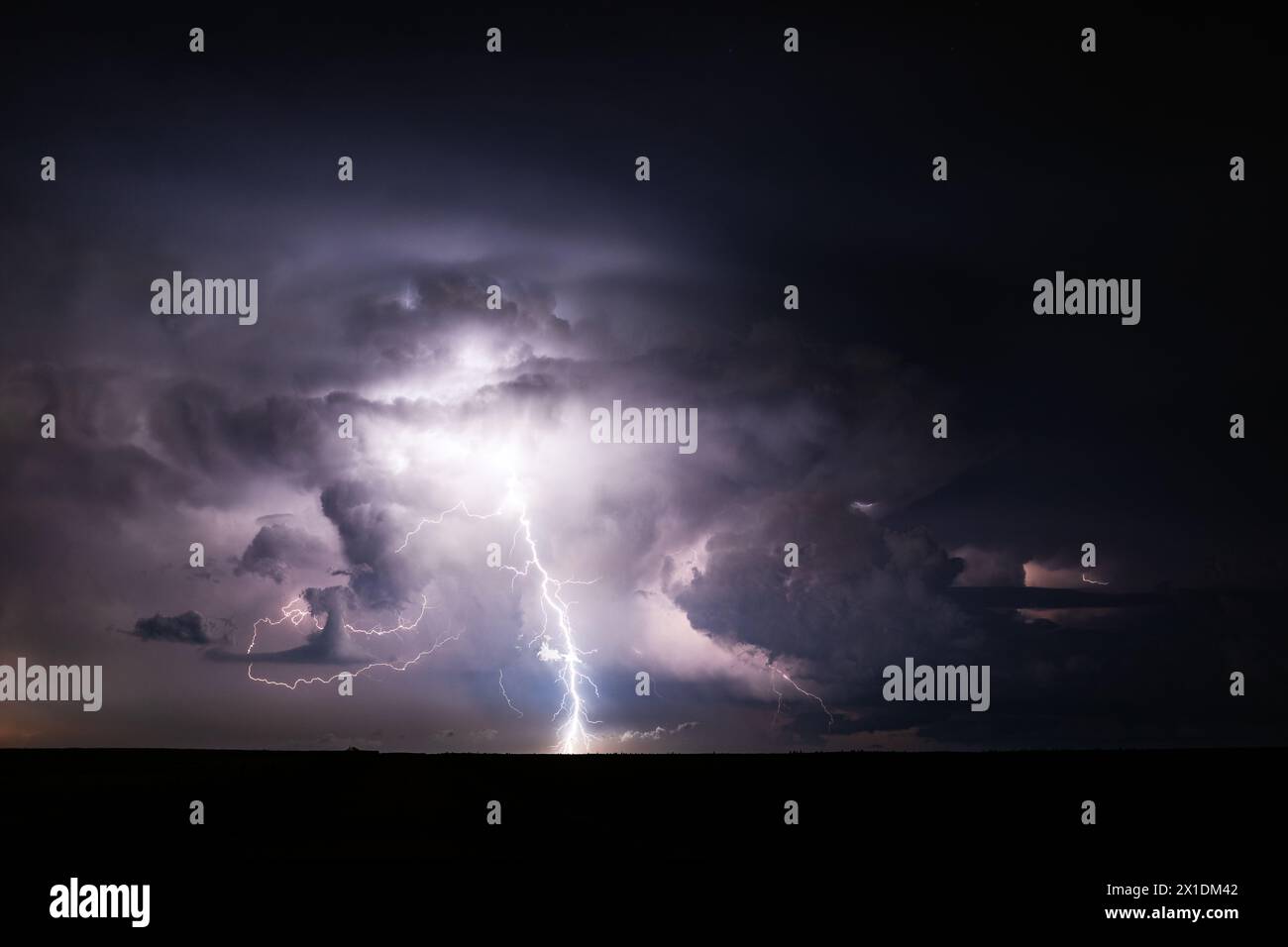 Nighttime thunderstorm and lightning bolt near Akron, Colorado, USA Stock Photo