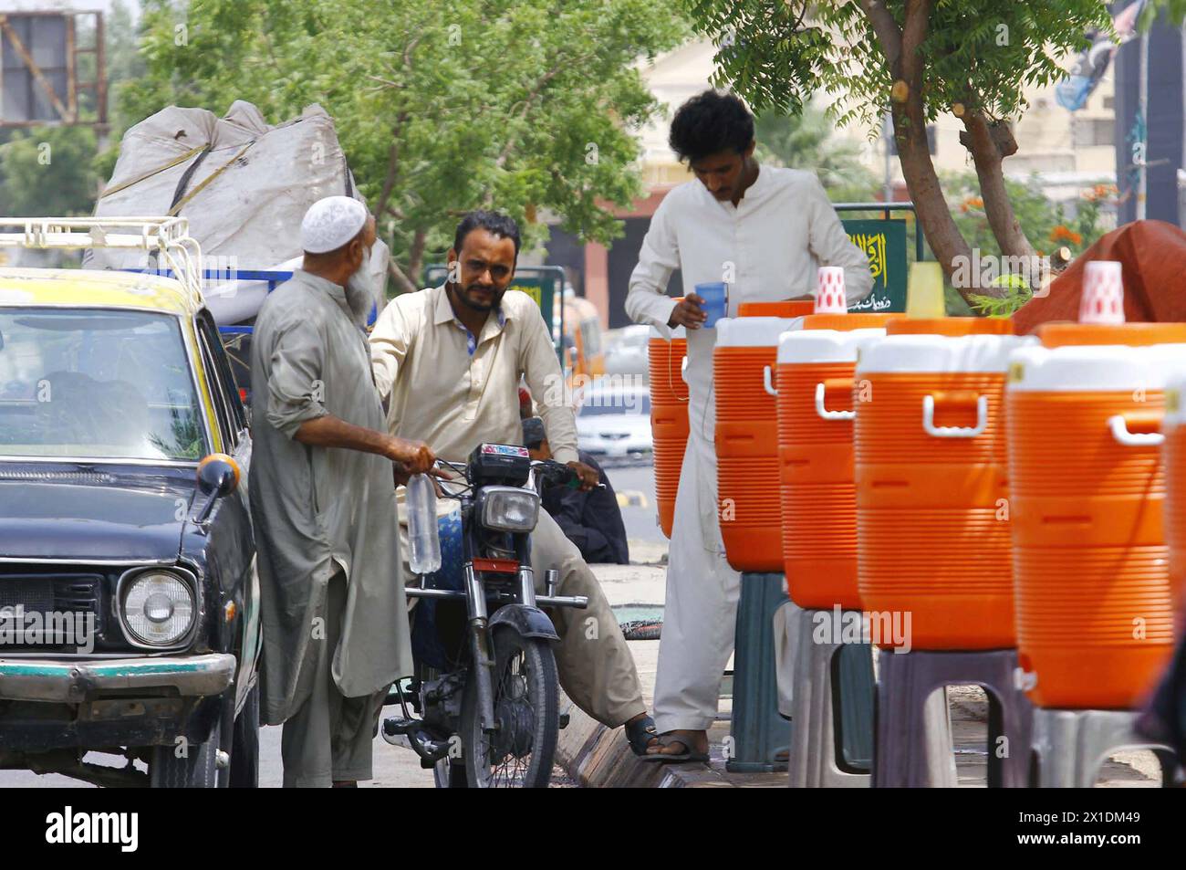Pakistan Rashid Water People are drinking chilled water to beat the heat of sun at a camp ...