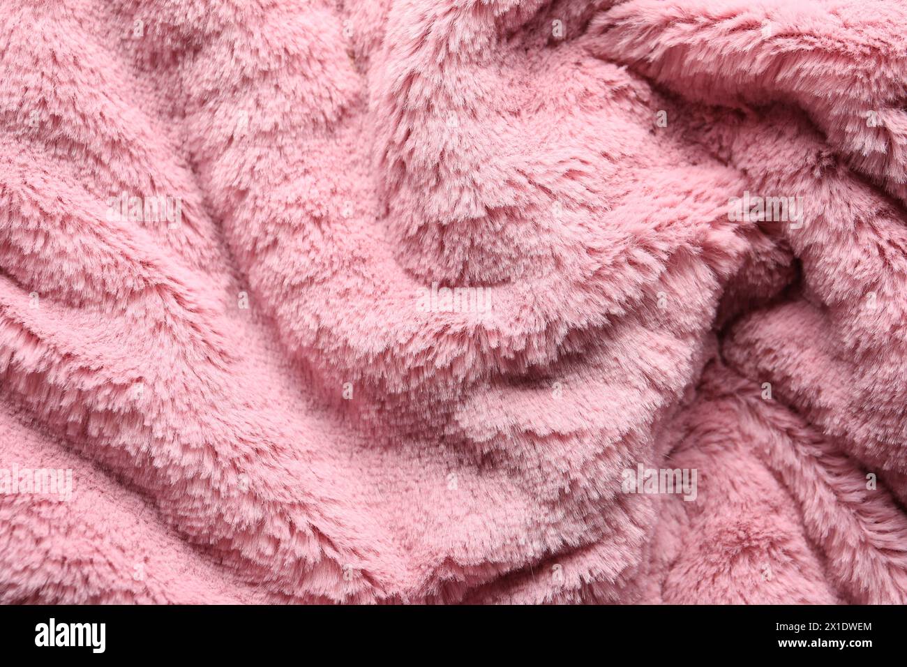 Texture of pink faux fur as background, closeup Stock Photo