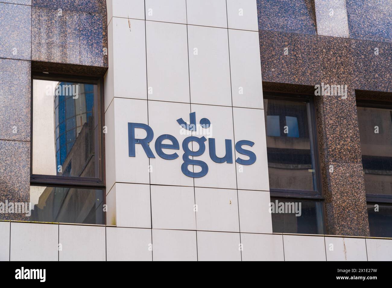 Birmingham, UK 16th April 2024: External signage of serviced office company, Regus Stock Photo