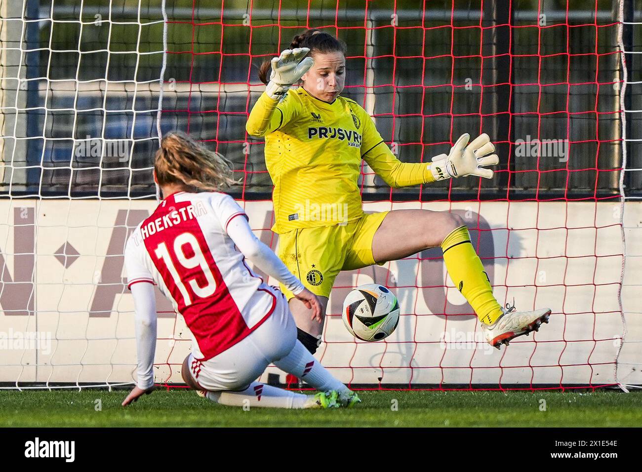 Amsterdam, Netherlands. 16th Apr, 2024. Amsterdam - Tiny Hoekstra of Ajax Vrouwen scores the 1-0 during the match between Ajax V1 v Feyenoord V1 at De Toekomst on 16 April 2024 in Amsterdam, Netherlands. Credit: box to box pictures/Alamy Live News Stock Photo