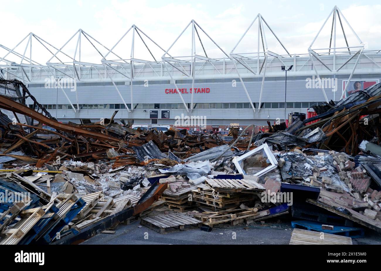 The remains of a plastics warehouse, where a blaze last month caused the original fixture to be postponed, ahead of the Sky Bet Championship match at St Mary's Stadium, Southampton. Picture date: Tuesday April 16, 2024. Stock Photo