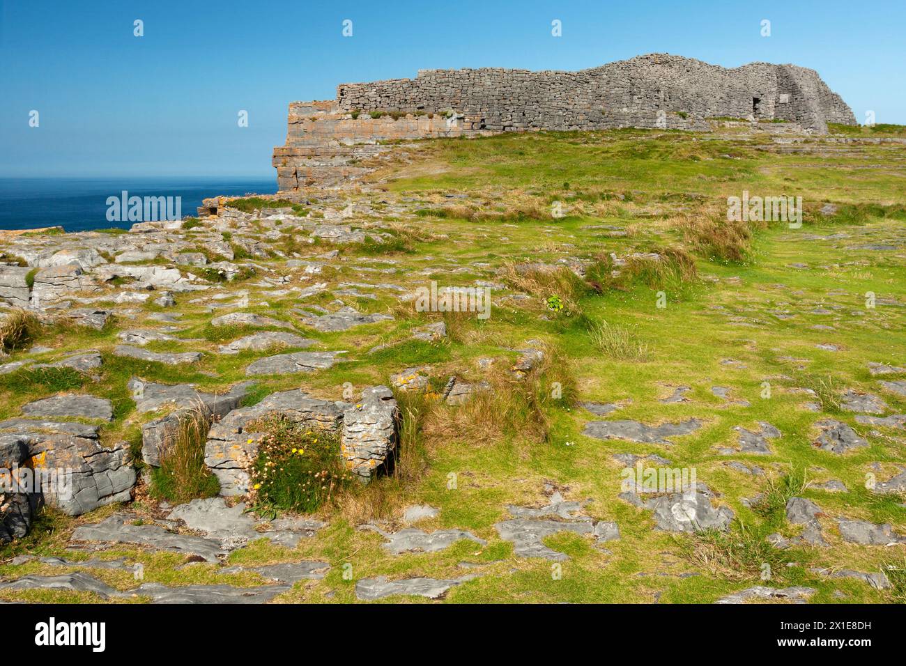 Dun Aonghasa or Dun Aengus fort on the cliff edge on Inishmore island in the Aran islands on the Wild Atlantic Way in Galway in Ireland Europe Stock Photo