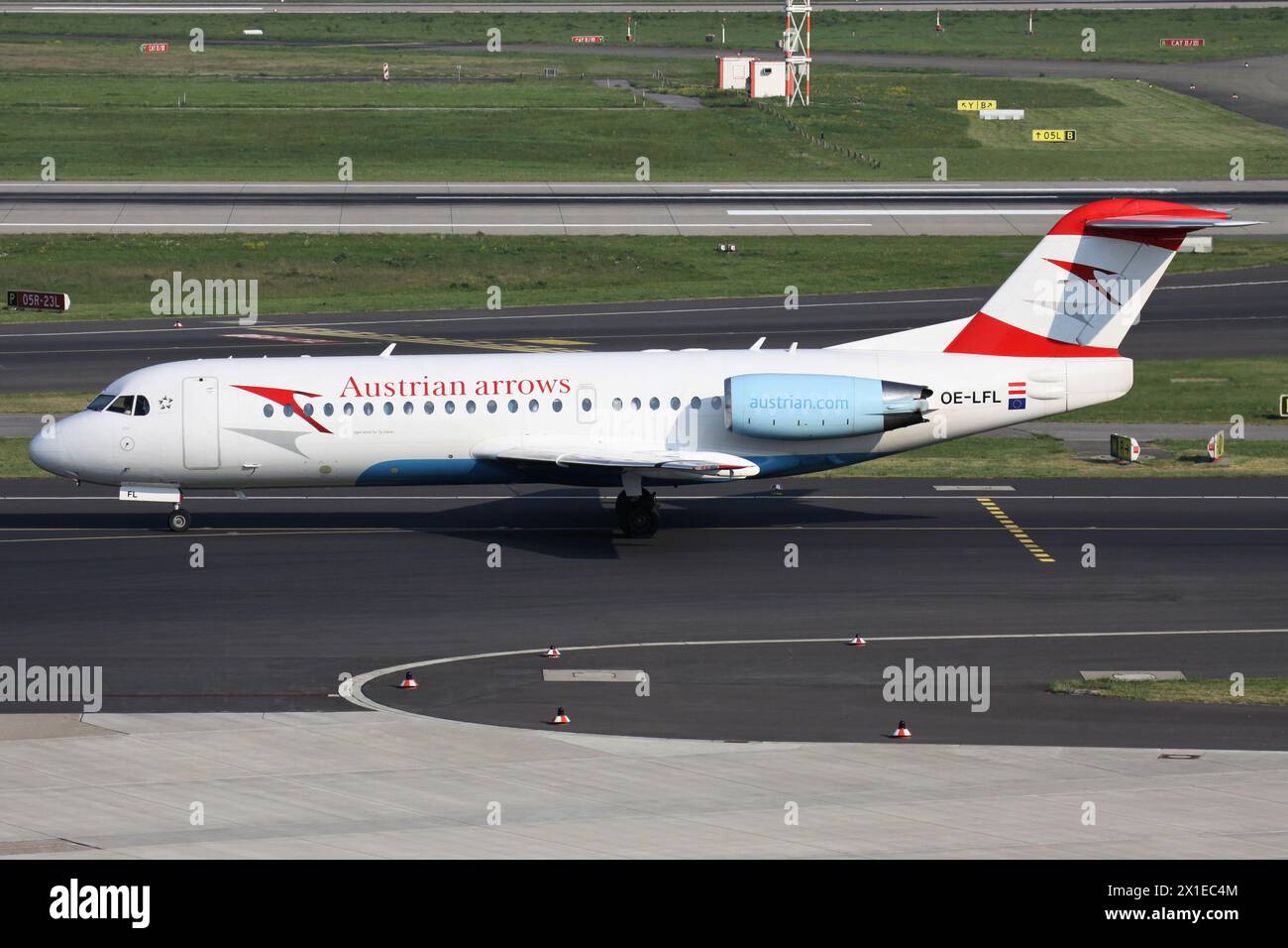 Austrian arrows Fokker 70 with registration OE-LFL on taxiway at Dusseldorf Airport Stock Photo