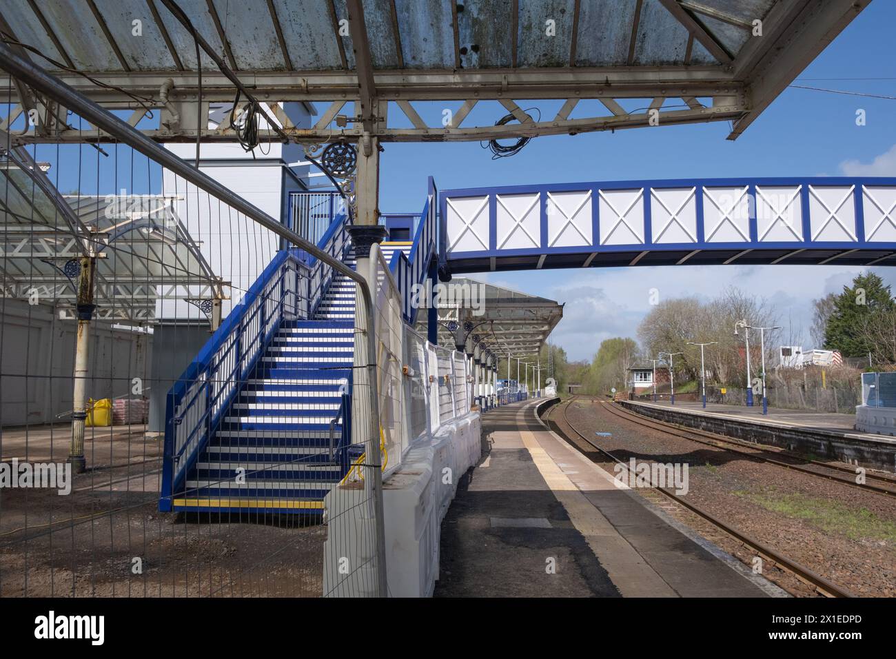 Another view of a new railway station footbridge under construction in Dumfries, Scotland.  The new design includes lifts to improve passenger access. Stock Photo