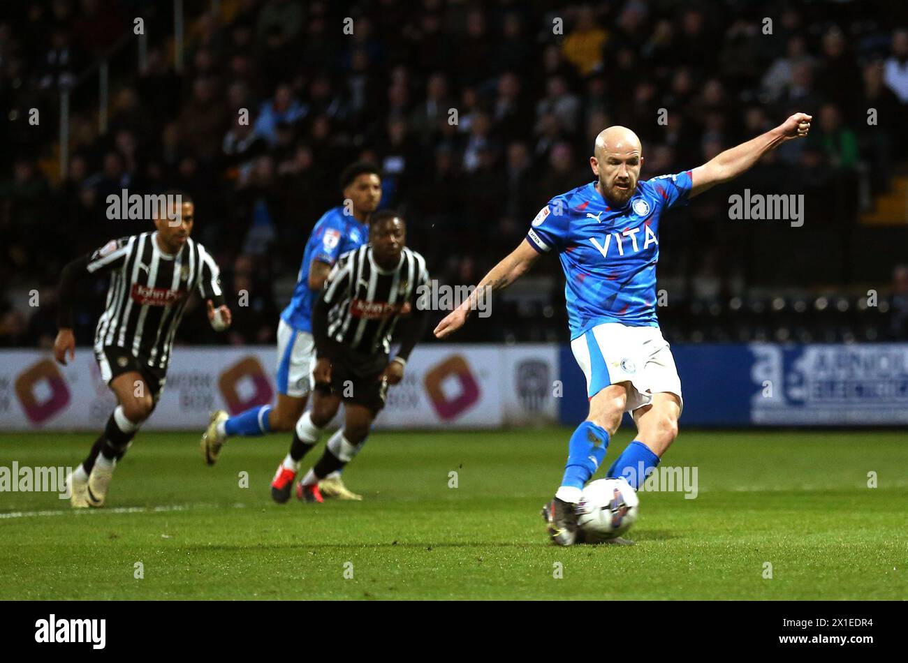 Stockport County's Patrick Madden (right) scores their side's second goal of the game from a penalty during the Sky Bet League Two match at Meadow Lane, Nottingham. Picture date: Tuesday April 16, 2024. Stock Photo